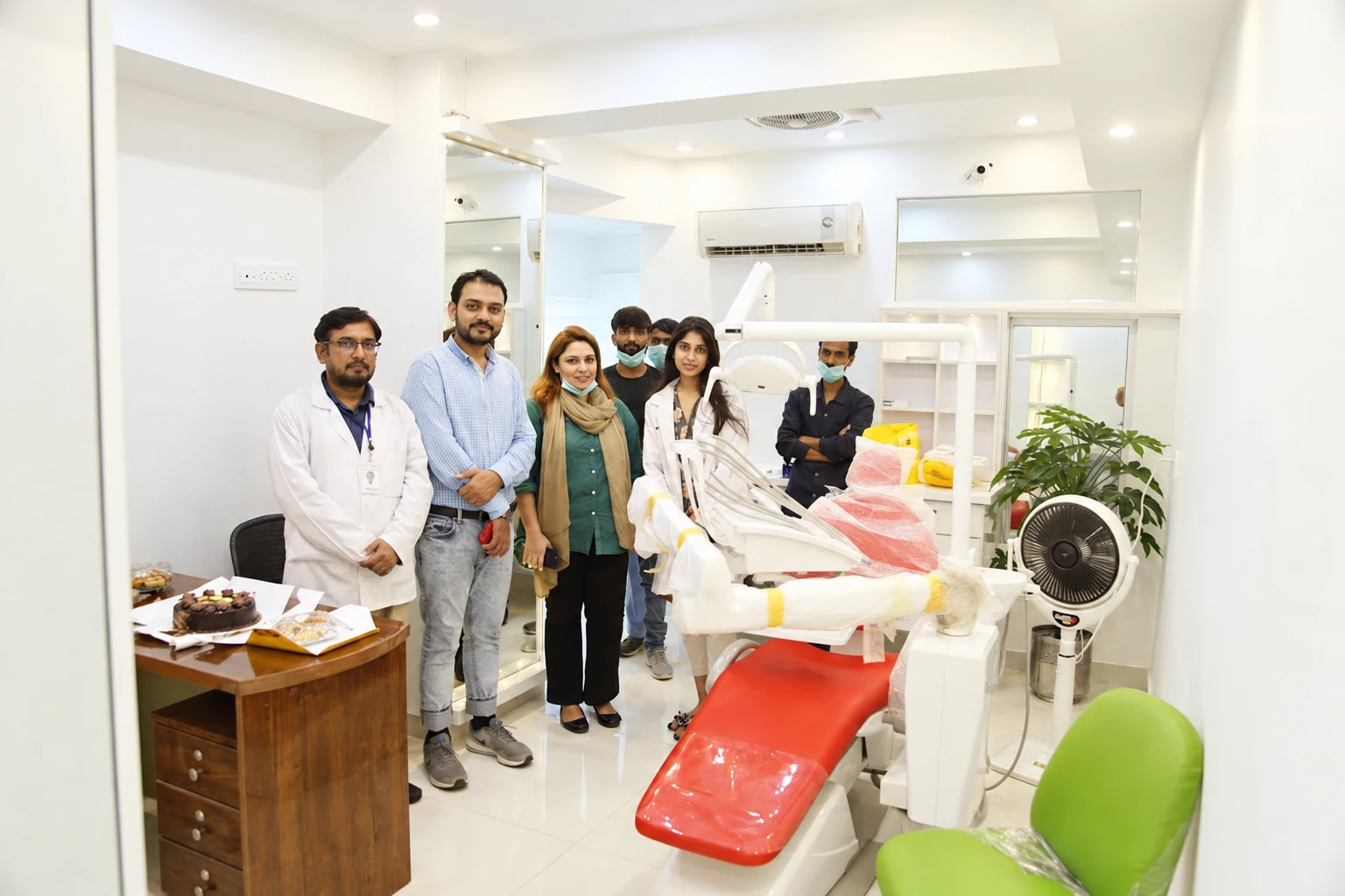 Smile by Alkhaleej team gathered in the clinic treatment room